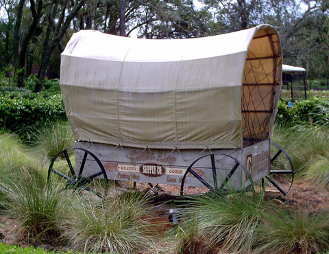 Wagon in front of settlement trading post 2